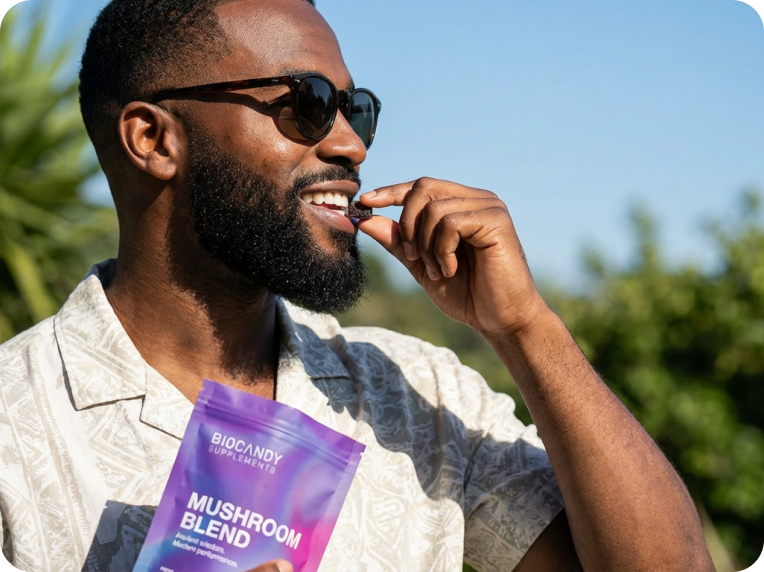 Man eating gummy outdoors